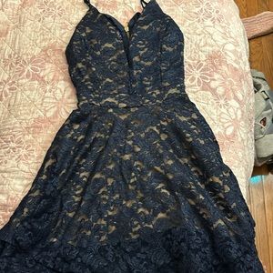 Selling  a EMERALD SUNDAE Womens Navy Glitter Floral dress. Worn only once